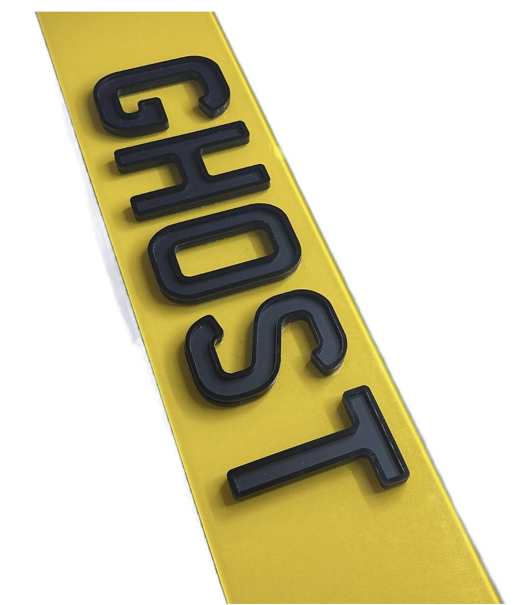 Side view of 4D Metro ghost plate characters showing the layered raised edge