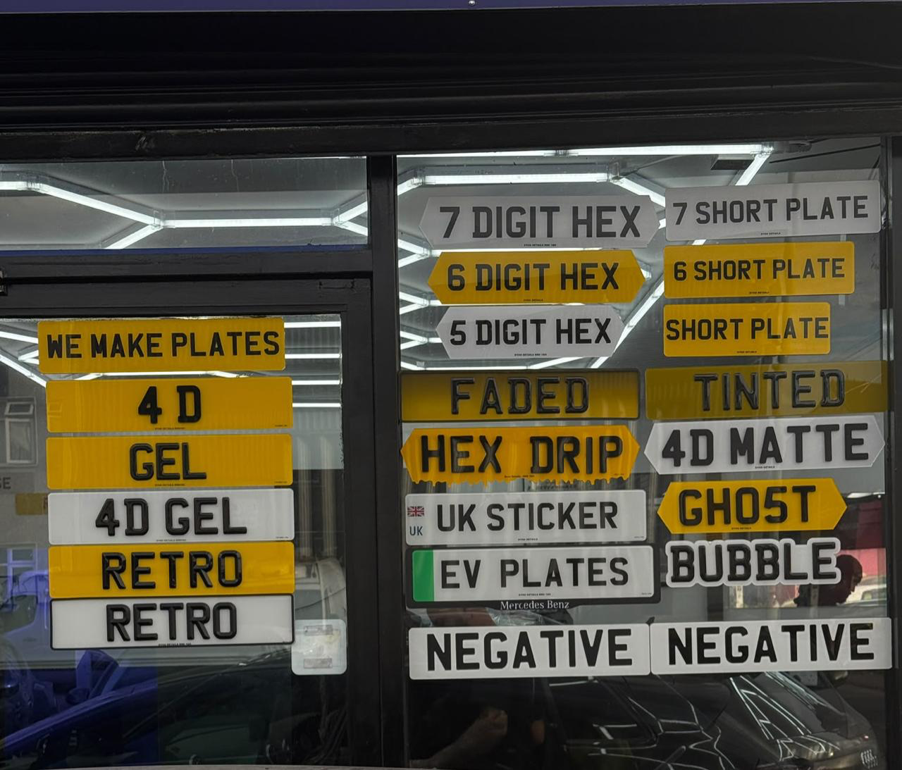 Dyno Details shop window showing the full plate range: 4D, gel, 4D gel, retro, hex, short, faded, tinted, drip hex, 4D matte, ghost, bubble, UK sticker, EV and negative plates